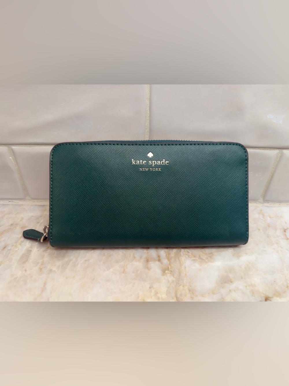 kate spade emerald green wallet with gold logo